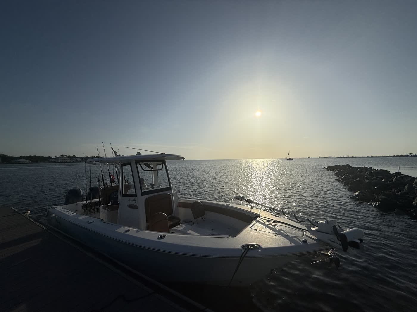 Big Fish Energy charter boat docked at sunrise, perfect for kids and family fishing trips