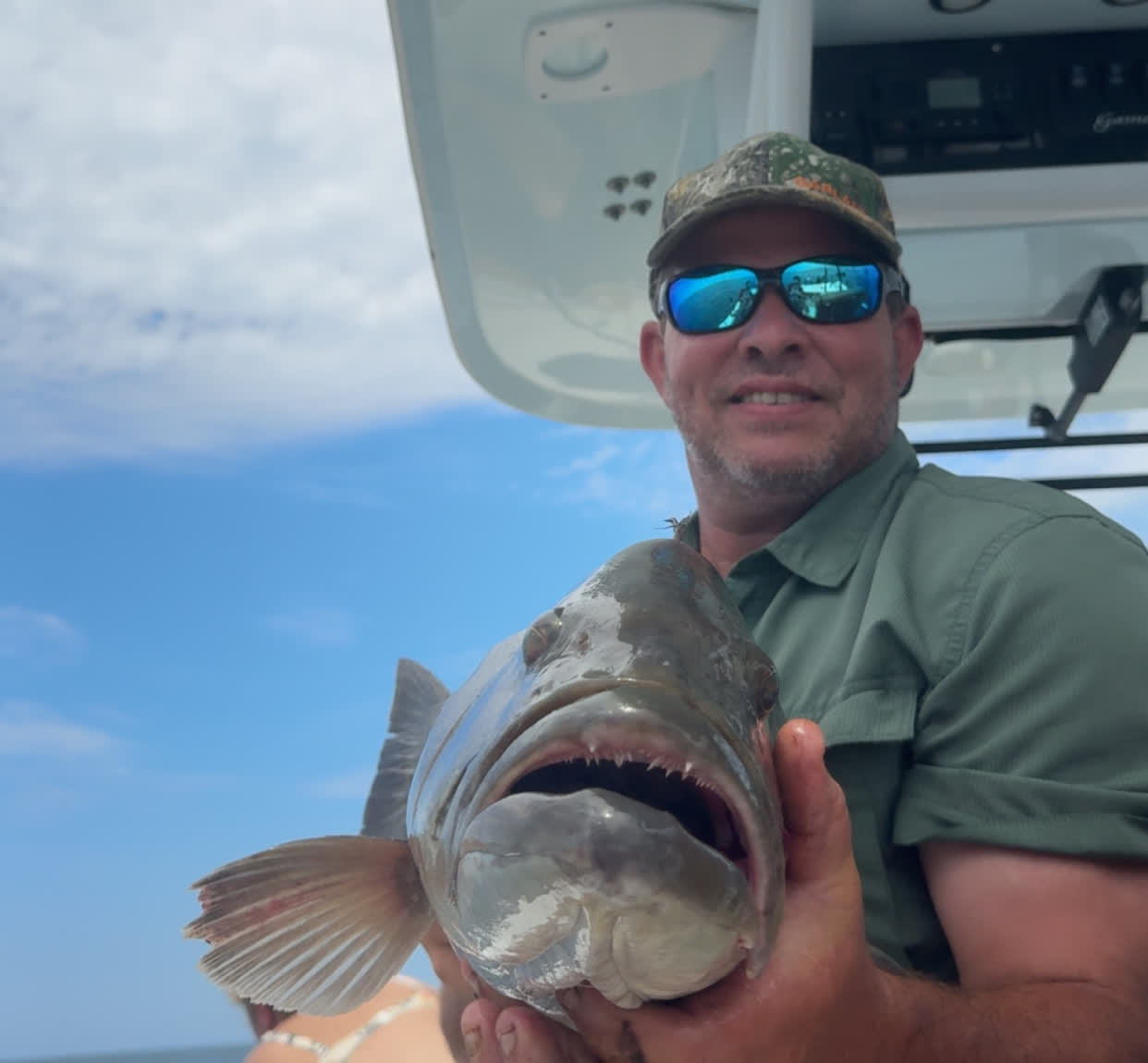 A great grouper catch from a Big Fish Energy nearshore fishing trip